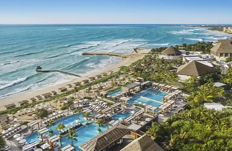 https://mail.sqnescapes.com/Riviera Maya Vidanta resort showcasing lush greenery, sparkling pools, and luxurious accommodations